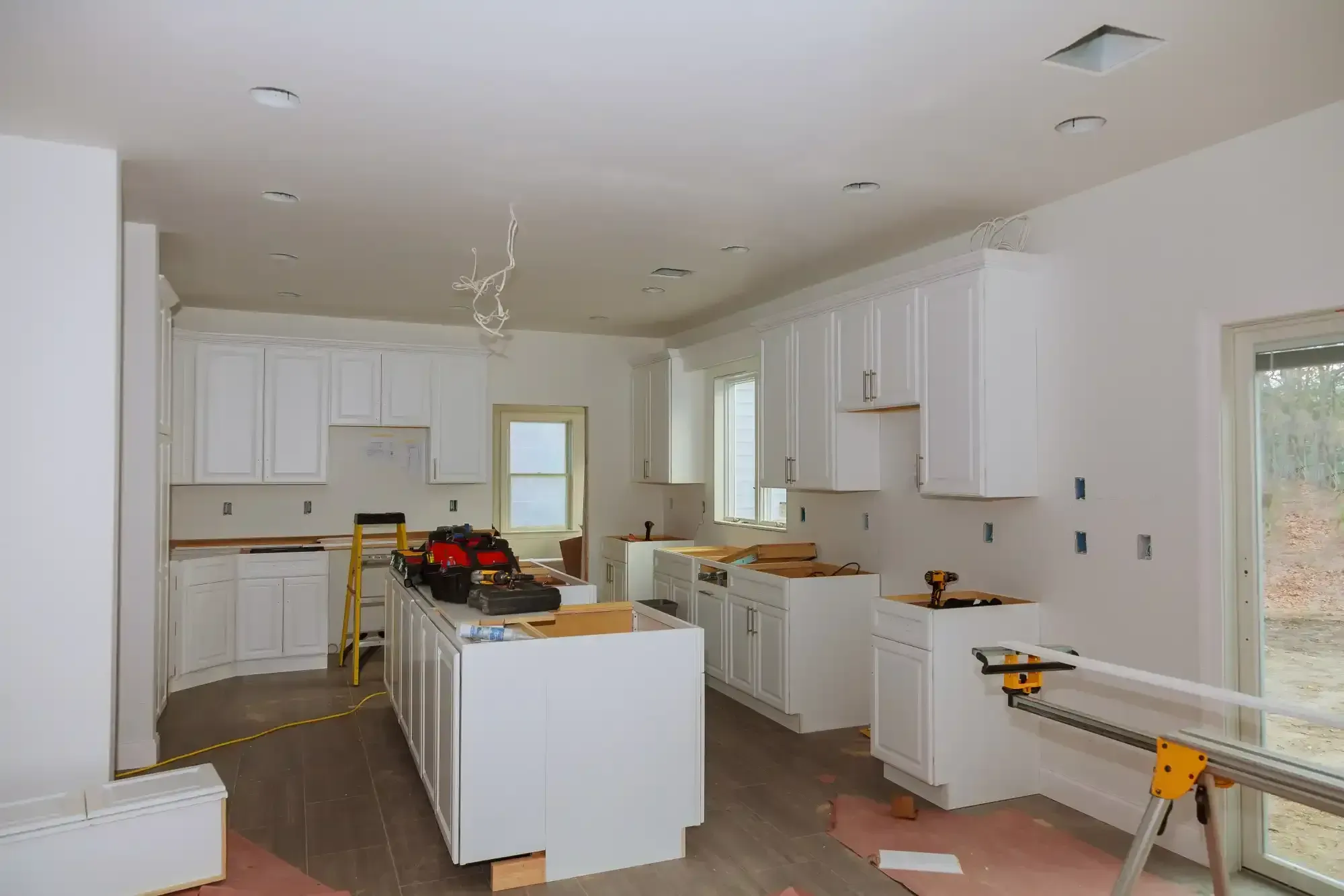 Kitchen remodel in progress with new cabinetry